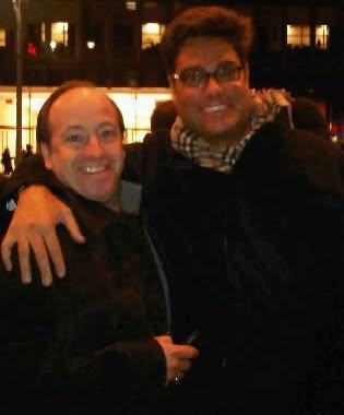 Two men posing at night while waiting to go into a taping of the David Letterman show in New York City