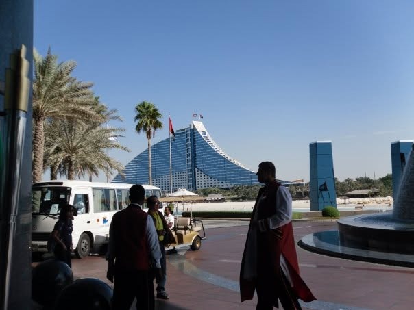 Doormen in red and gold uniforms at the hotel entrance