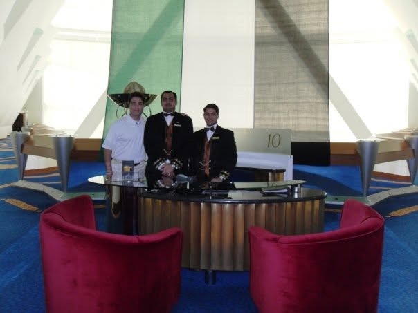 Matthew with the reception team at the private floor desk