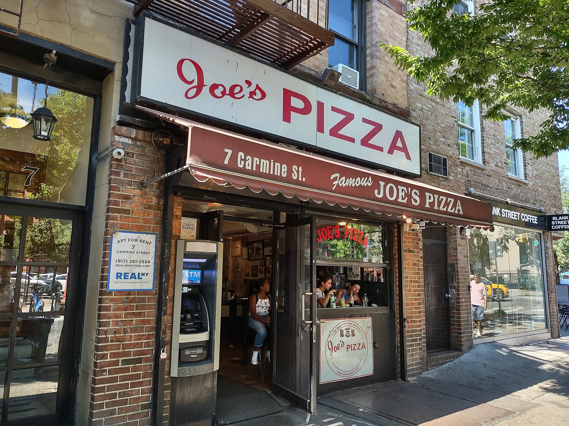 Classic New York slice pizza counter in Greenwich Village