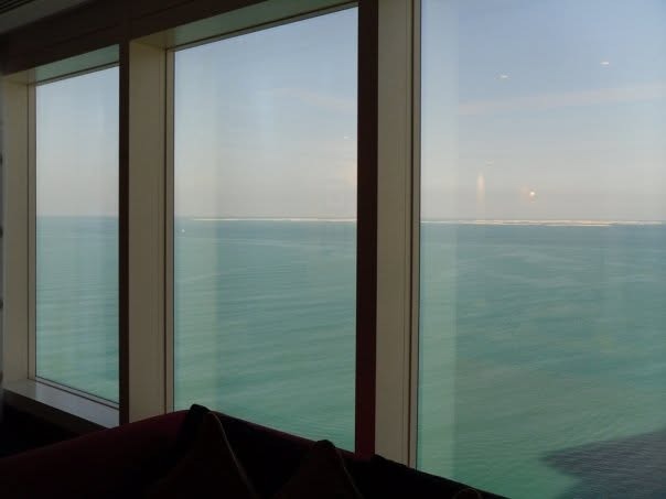 Open sea through floor-to-ceiling windows
