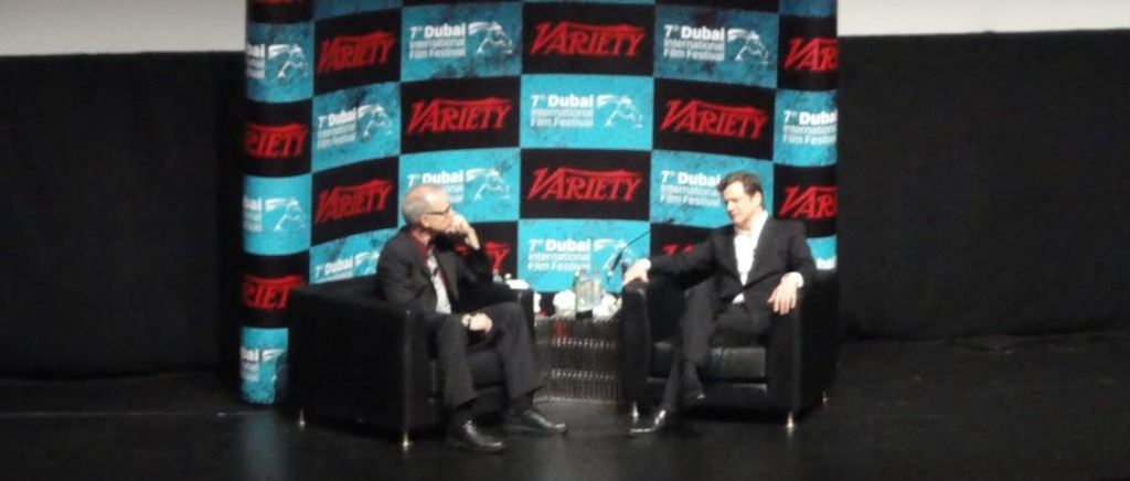 Colin Firth in conversation on stage in front of the Variety backdrop